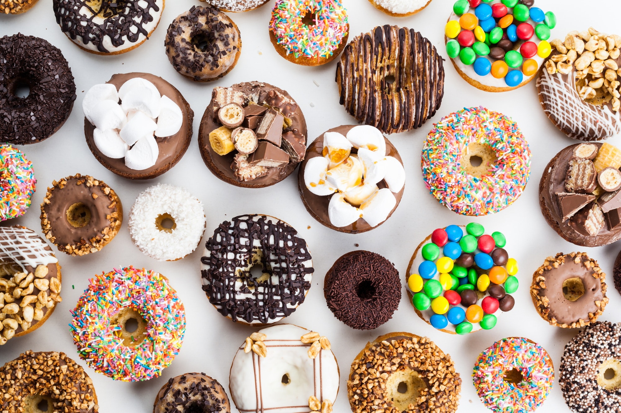 Close up of a selection of colorful donuts.